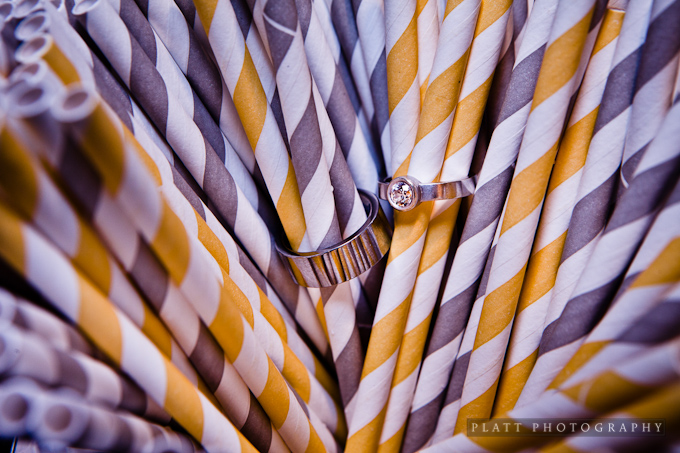 wedding rings and straws for sodas